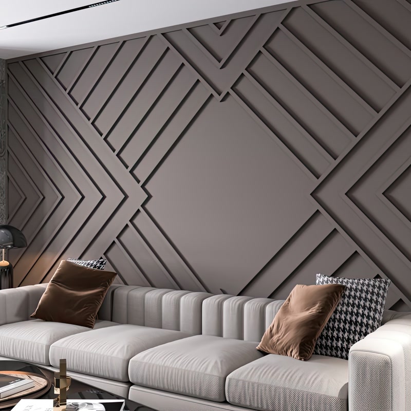 Vizon rengi geometrik diyagonal duvar çıtası paneli önünde krem rengi modern koltuk ve kırlentler