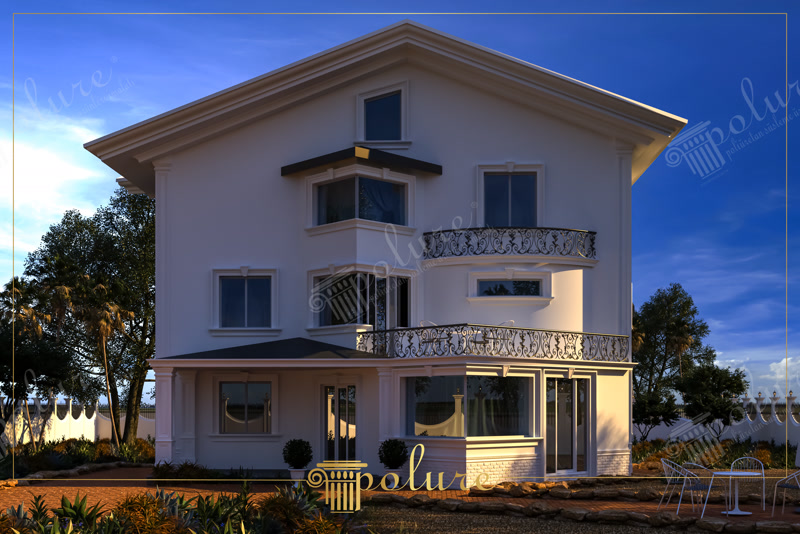 Gün batımı ışığında cumbası, kavisli ferforje balkonu ve pencere söveleri görünen üç katlı beyaz müstakil villa cephe kaplaması.