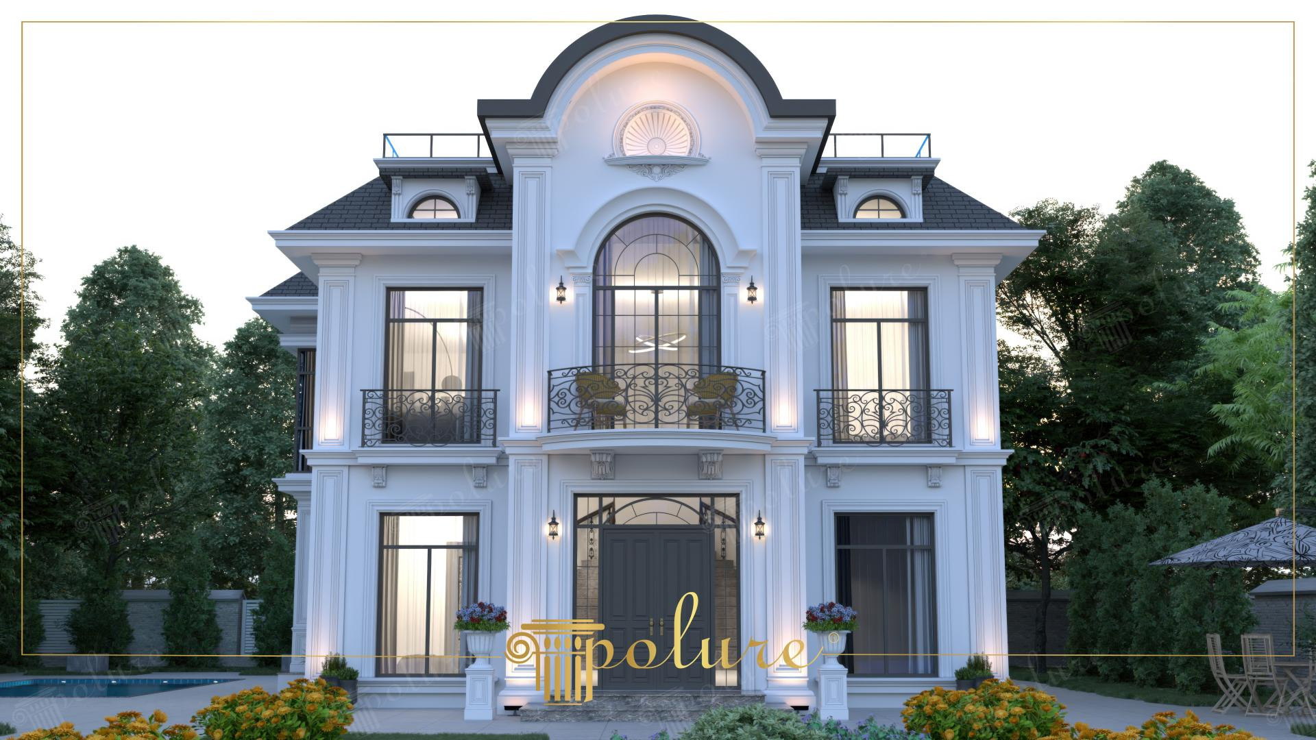 Akşam aydınlatması altında büyük merkezi kemeri, Fransız balkonları ve söve çerçeveleri olan neoklasik villa cephesi