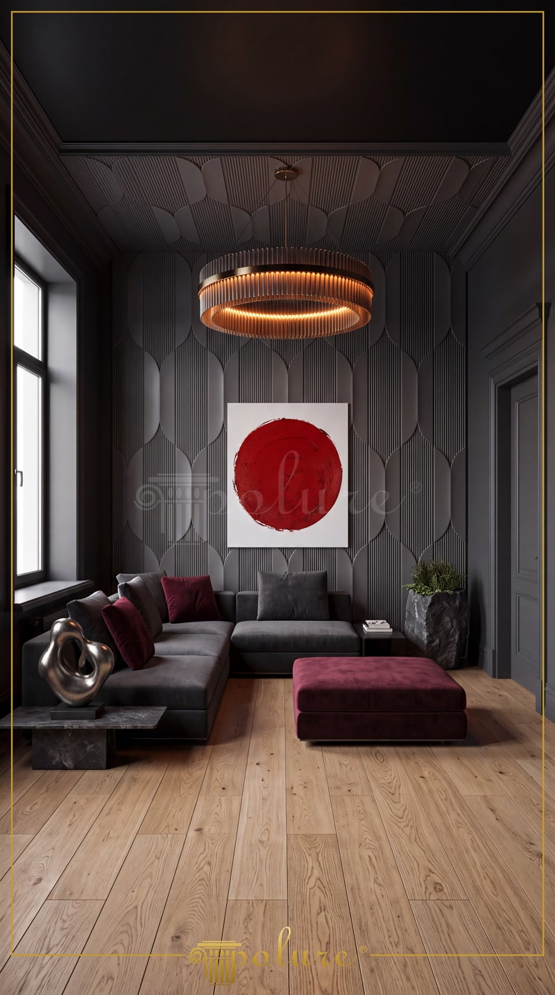 Antrasit 3D geometrik duvar paneli, kapı sövesi ve kırmızı dairesel tablolu modern salon