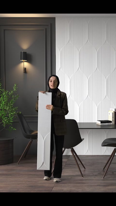 Dikey sergilenen oluklu panel ile geometrik duvar kaplaması