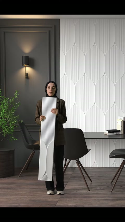 Oluklu panel örneği, tamamlanmış geometrik duvar dekorasyonuyla birlikte sunuluyor.