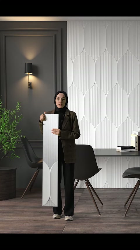 Dikey panelin yüzeyi elle belirtilerek çizgili tasarım ayrıntısı tanıtılıyor.