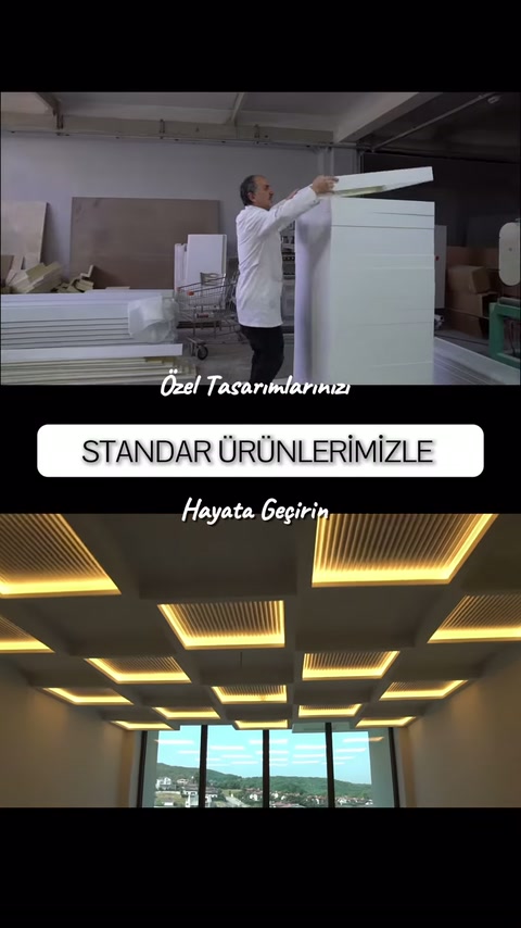 Usta uzun beyaz armatür parçasını üretim alanında yukarı kaldırıyor